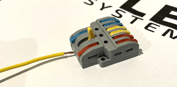 Stripped conductor inserted into a Flex Systems lever terminal
